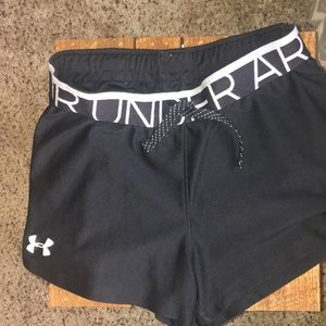 Young black under armour running shorts.